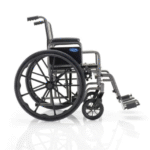 Lightweight standard wheelchair by Invacare with swing-away footrests and desk-length arms
